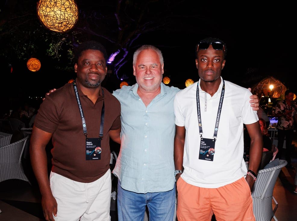 Segun Akande with guests at an evening event